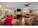 Spacious living room with hardwood floors, providing ample seating and natural light at 12545 Druids Glen Dr, Pineville, NC 28134