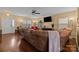 Spacious living room with hardwood floors, providing ample seating at 12545 Druids Glen Dr, Pineville, NC 28134