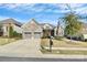 Beautiful stone-faced home featuring a two-car garage and well-maintained lawn, complemented by a mailbox at 14920 High Bluff Ct, Charlotte, NC 28278