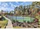 Outdoor tennis courts offer a great space for recreation and exercise at 14920 High Bluff Ct, Charlotte, NC 28278