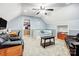 Cozy bonus room with comfortable seating, desk, and a playful game nook for relaxation and entertainment at 1625 Saint Paul Church Rd, Salisbury, NC 28146