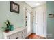 Inviting entryway featuring hardwood floors, decorative accents, and natural light, creating a warm welcome at 1625 Saint Paul Church Rd, Salisbury, NC 28146