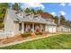 Charming home features a well-manicured lawn, inviting porch, and attached garage for modern living at 1625 Saint Paul Church Rd, Salisbury, NC 28146