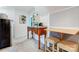 Kitchenette featuring an antique table and bar seating, ideal for casual dining at 1625 Saint Paul Church Rd, Salisbury, NC 28146