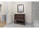 Bathroom with a dark wood vanity, white ceramic basin, and tiled floor with a neutral color scheme at 1641 Knoll Dr, Vale, NC 28168