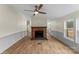 Open living room with a brick fireplace and view of kitchen at 1641 Knoll Dr, Vale, NC 28168