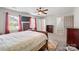 Spacious bedroom with carpet flooring and ensuite bathroom at 16417 Grapperhall Dr, Huntersville, NC 28078