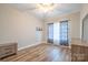 Bedroom featuring wood-look floors, neutral walls, and natural light at 1700 Ivey Ct, Maiden, NC 28650