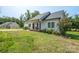 Charming single-story home featuring a well-maintained lawn and a cozy front porch with chairs at 1700 Ivey Ct, Maiden, NC 28650