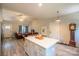 Well-lit kitchen and open-plan living room, offering an airy and inviting atmosphere at 1700 Ivey Ct, Maiden, NC 28650