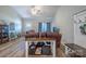 Comfortable living room featuring leather furniture, wood-look floors, and ample natural light at 1700 Ivey Ct, Maiden, NC 28650