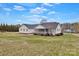 Expansive backyard featuring a screened porch at 207 Silver Creek Ln, Shelby, NC 28152