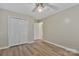 Comfortable bedroom featuring modern flooring and a spacious closet at 207 Silver Creek Ln, Shelby, NC 28152
