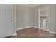 The dining room features gorgeous wood-look flooring and neutral paint that continues to the kitchen at 207 Silver Creek Ln, Shelby, NC 28152