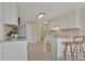 Spacious kitchen boasts white cabinetry, granite countertops, and stainless steel appliances at 207 Silver Creek Ln, Shelby, NC 28152