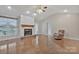 Bright living room with fireplace, natural light, and hardwood floors at 207 Silver Creek Ln, Shelby, NC 28152