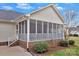 Enclosed back porch with a brick foundation at 207 Silver Creek Ln, Shelby, NC 28152