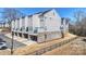 Attractive row of townhomes with brick accents and manicured lawns at 208 Emerson Ave, Charlotte, NC 28204
