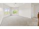 Bright bedroom featuring two large windows providing an abundance of natural light at 2251 Barrowcliffe Nw Dr, Concord, NC 28027