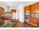 Modern kitchen with stainless appliances, stone backsplash, and ample cabinet space at 2251 Barrowcliffe Nw Dr, Concord, NC 28027