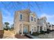 Charming two-story townhouse with a covered front porch and neatly landscaped yard at 2259 Crosscut Dr, Charlotte, NC 28214
