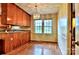 Charming dining area filled with natural light with traditional cabinetry, ready to be your new favorite gathering spot at 3400 Tracelake Dr, Matthews, NC 28105