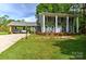 Spacious home featuring a covered carport, perfect for parking vehicles and providing protection from the elements at 3400 Tracelake Dr, Matthews, NC 28105