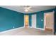 Bedroom with en-suite bathroom, ceiling fan and neutral colored walls at 3516 Araglin Dr, Gastonia, NC 28056