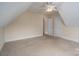 This bedroom features neutral walls, a ceiling fan and multiple closets, perfect for a spacious and uncluttered living space at 3516 Araglin Dr, Gastonia, NC 28056