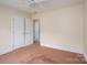 Neutral bedroom features carpeting and two doors at 3516 Araglin Dr, Gastonia, NC 28056