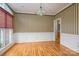Formal dining room with hardwood floors, wallpaper, and large window at 3516 Araglin Dr, Gastonia, NC 28056