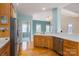 Spacious kitchen featuring stainless steel appliances, white countertops, and oak cabinets at 3516 Araglin Dr, Gastonia, NC 28056