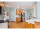 Well-lit kitchen featuring stainless steel appliances and oak cabinets at 3516 Araglin Dr, Gastonia, NC 28056