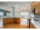 Modern kitchen with oak cabinets, stainless appliances, open to living areas, perfect for entertaining at 3516 Araglin Dr, Gastonia, NC 28056