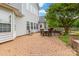 Back patio with a circular brick design and ample seating space at 4036 Sawmill Trace Dr, Charlotte, NC 28213