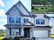 Northeast-facing two-story home with stone accents, shutters, covered entry, and horse pasture views at 4253 Stream Dale Nw Cir, Concord, NC 28027