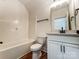 Bathroom with a shower/tub combination and a vanity with a bright mirror at 4262 Brandy Creek Ct, Clover, SC 29710
