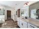 Modern bathroom featuring double vanity, framed mirrors, and luxurious walk-in shower at 4262 Brandy Creek Ct, Clover, SC 29710