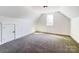 Cozy bedroom with dormered ceiling, carpet, and a bright window at 4262 Brandy Creek Ct, Clover, SC 29710