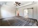 Large primary bedroom with trey ceilings offering a modern design with luxury Primary bath and walk in closet at 4262 Brandy Creek Ct, Clover, SC 29710