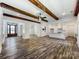 Spacious living room features wood beam ceilings and an open layout at 4262 Brandy Creek Ct, Clover, SC 29710