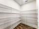 Spacious walk-in pantry with ample shelving provides generous storage space at 4262 Brandy Creek Ct, Clover, SC 29710