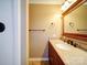 Bathroom vanity features granite countertop and wooden cabinetry at 4401 Coachwood Ln, Gastonia, NC 28056