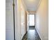 An inviting entryway with tile floors and a view of the front porch through the storm door at 4401 Coachwood Ln, Gastonia, NC 28056