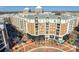 Aerial view showcasing apartments, shops, restaurants, and community in urban neighborhood at 4620 Piedmont Row Dr # 605, Charlotte, NC 28210