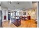 Open concept kitchen with island, stainless steel appliances and view to dining room at 4620 Piedmont Row Dr # 605, Charlotte, NC 28210