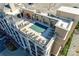 Aerial view of a rooftop lounge featuring an in-ground pool and lounge seating at 4620 Piedmont Row Dr # 605, Charlotte, NC 28210