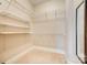 Empty walk-in closet with shelving at 4620 Piedmont Row Dr # 605, Charlotte, NC 28210