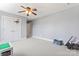 Spacious bedroom with neutral walls, carpet and ceiling fan, great for personalization at 4858 Sagittarius Cir, Denver, NC 28037