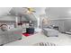 Comfortable bonus room with gray walls, a ceiling fan, and a large sectional sofa at 4858 Sagittarius Cir, Denver, NC 28037